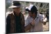 OUT OF AFRICA, 1985 directed by SYDNEY POLLACK On the set, Sydney Pollack directs Rober Redford (ph-null-Mounted Photo