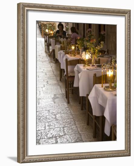 Outdoor cafe in cobblestone alley, Dubrovnik, Dalmatia, Croatia-Merrill Images-Framed Photographic Print