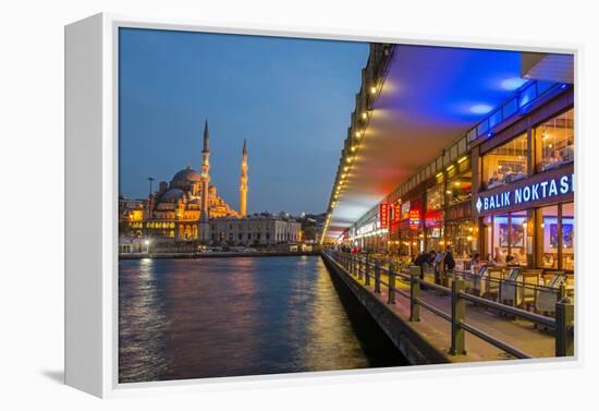 Outdoor Restaurants under Galata Bridge with Yeni Cami or New Mosque at Dusk, Istanbul-Stefano Politi Markovina-Framed Premier Image Canvas