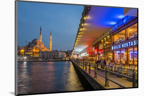 Outdoor Restaurants under Galata Bridge with Yeni Cami or New Mosque at Dusk, Istanbul-Stefano Politi Markovina-Mounted Photographic Print