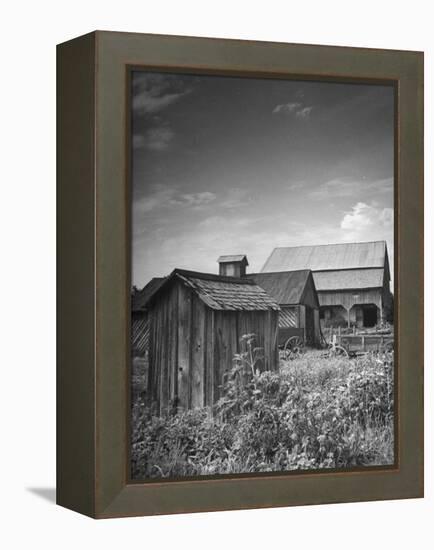 Outhouse Sitting Behind the Barn on a Farm-Bob Landry-Framed Premier Image Canvas