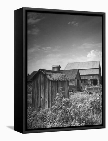 Outhouse Sitting Behind the Barn on a Farm-Bob Landry-Framed Premier Image Canvas