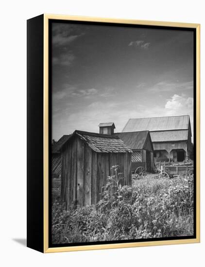 Outhouse Sitting Behind the Barn on a Farm-Bob Landry-Framed Premier Image Canvas