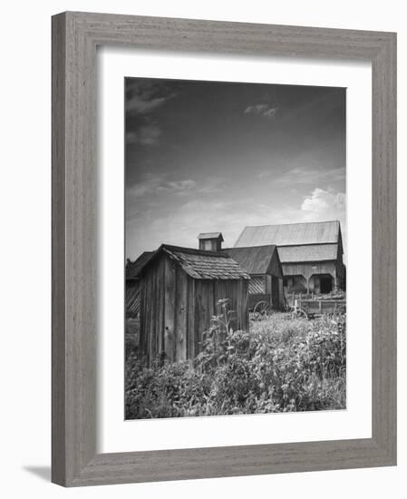Outhouse Sitting Behind the Barn on a Farm-Bob Landry-Framed Photographic Print