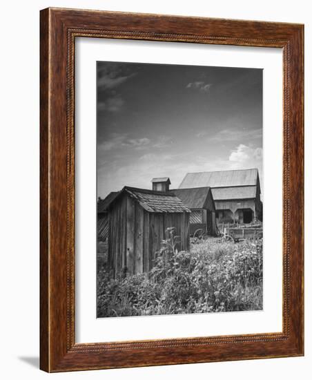 Outhouse Sitting Behind the Barn on a Farm-Bob Landry-Framed Photographic Print