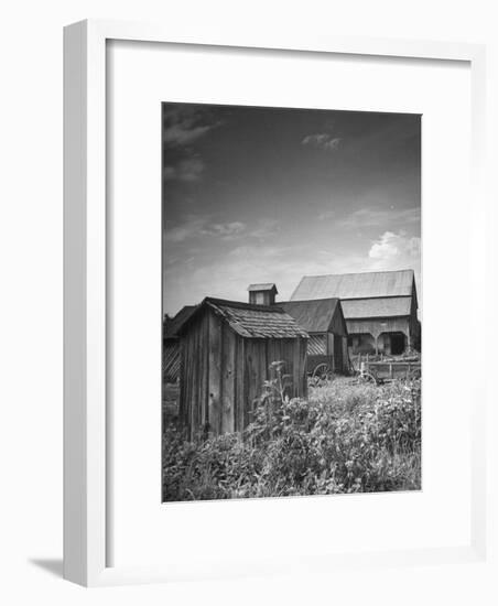 Outhouse Sitting Behind the Barn on a Farm-Bob Landry-Framed Photographic Print