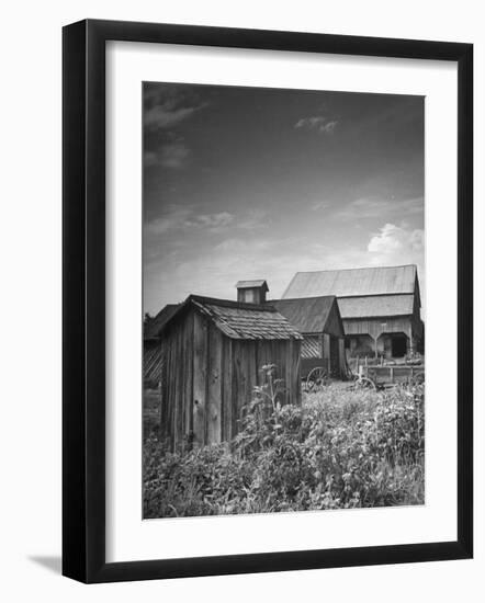 Outhouse Sitting Behind the Barn on a Farm-Bob Landry-Framed Photographic Print