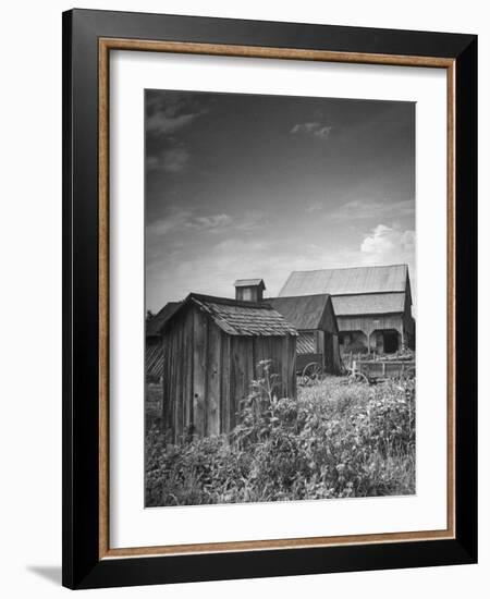 Outhouse Sitting Behind the Barn on a Farm-Bob Landry-Framed Photographic Print