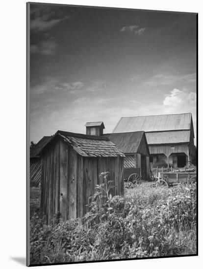 Outhouse Sitting Behind the Barn on a Farm-Bob Landry-Mounted Photographic Print