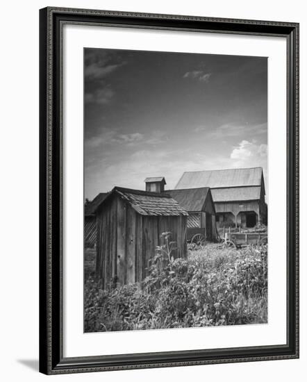 Outhouse Sitting Behind the Barn on a Farm-Bob Landry-Framed Photographic Print