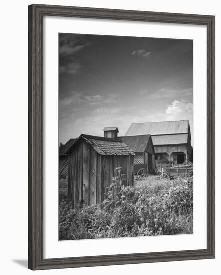 Outhouse Sitting Behind the Barn on a Farm-Bob Landry-Framed Photographic Print