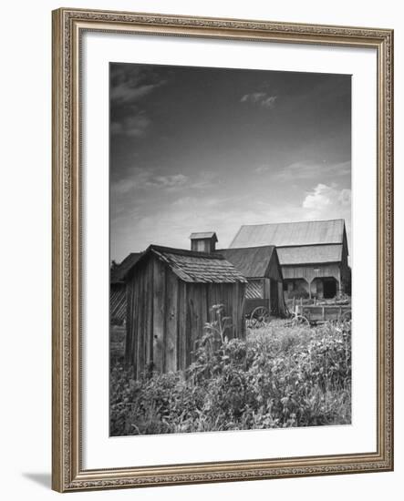 Outhouse Sitting Behind the Barn on a Farm-Bob Landry-Framed Photographic Print