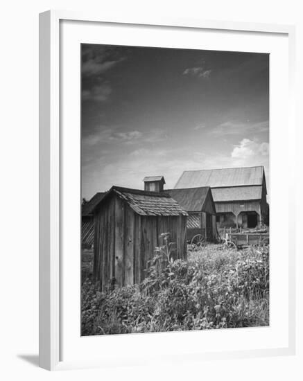 Outhouse Sitting Behind the Barn on a Farm-Bob Landry-Framed Photographic Print