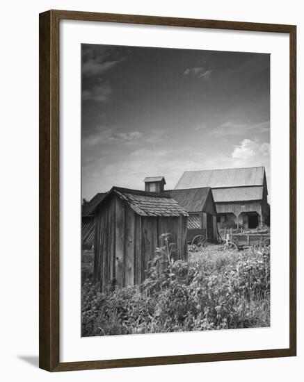 Outhouse Sitting Behind the Barn on a Farm-Bob Landry-Framed Photographic Print