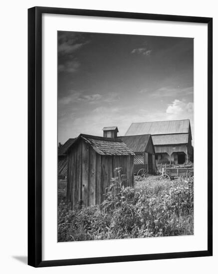 Outhouse Sitting Behind the Barn on a Farm-Bob Landry-Framed Photographic Print