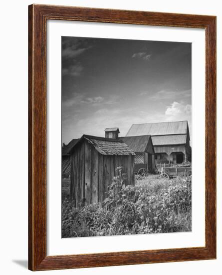 Outhouse Sitting Behind the Barn on a Farm-Bob Landry-Framed Photographic Print