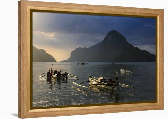 Outrigger Boat at Sunset in the Bay of El Nido, Bacuit Archipelago, Palawan, Philippines-Michael Runkel-Framed Premier Image Canvas