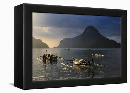 Outrigger Boat at Sunset in the Bay of El Nido, Bacuit Archipelago, Palawan, Philippines-Michael Runkel-Framed Premier Image Canvas