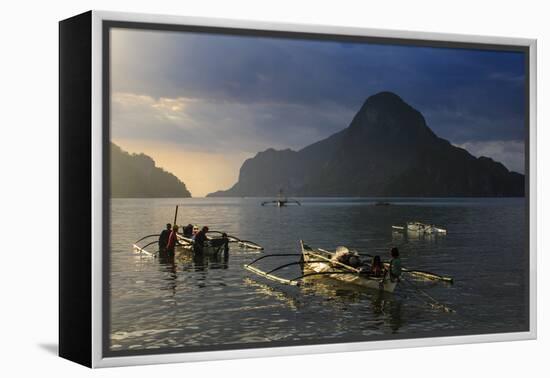 Outrigger Boat at Sunset in the Bay of El Nido, Bacuit Archipelago, Palawan, Philippines-Michael Runkel-Framed Premier Image Canvas