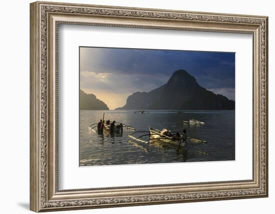 Outrigger Boat at Sunset in the Bay of El Nido, Bacuit Archipelago, Palawan, Philippines-Michael Runkel-Framed Photographic Print