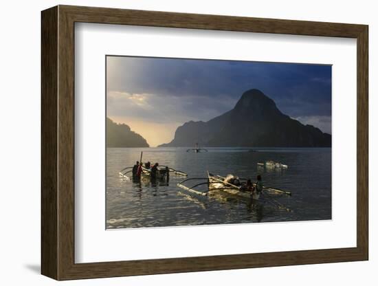 Outrigger Boat at Sunset in the Bay of El Nido, Bacuit Archipelago, Palawan, Philippines-Michael Runkel-Framed Photographic Print