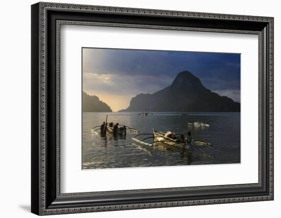 Outrigger Boat at Sunset in the Bay of El Nido, Bacuit Archipelago, Palawan, Philippines-Michael Runkel-Framed Photographic Print