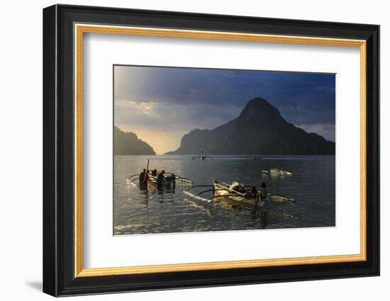 Outrigger Boat at Sunset in the Bay of El Nido, Bacuit Archipelago, Palawan, Philippines-Michael Runkel-Framed Photographic Print