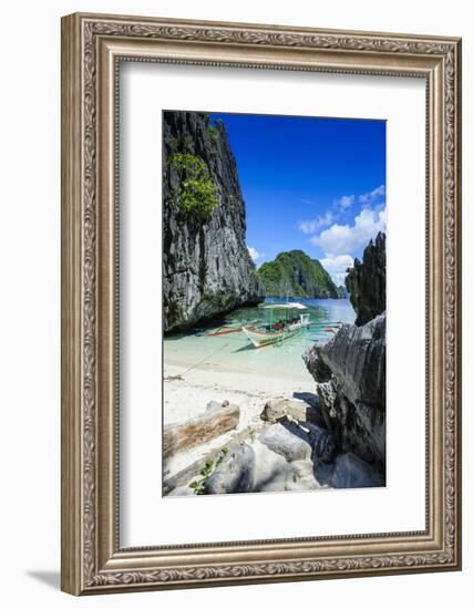 Outrigger Boat on a Little White Beach and Crystal Clear Water in the Bacuit Archipelago-Michael Runkel-Framed Photographic Print