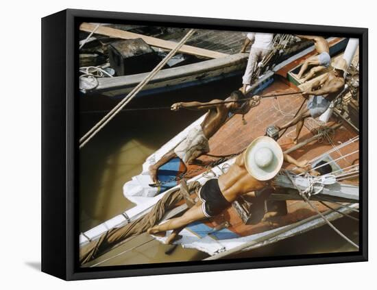 Overhead of Brazillian Men Working on a Small Cargo Boat-Dmitri Kessel-Framed Premier Image Canvas