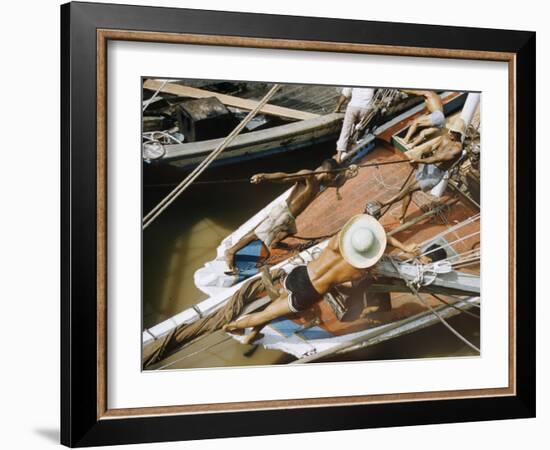 Overhead of Brazillian Men Working on a Small Cargo Boat-Dmitri Kessel-Framed Photographic Print