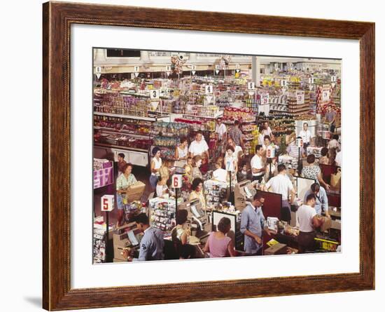 Overhead of Stacked Shelves of Food at Super Giant Supermarket with Shoppers Lined Up at Check Outs-John Dominis-Framed Photographic Print