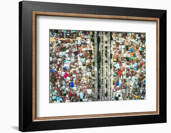 Overhead view of highway crossing the crowded city of Stone Town, Zanzibar, Tanzania-Roberto Moiola-Framed Photographic Print