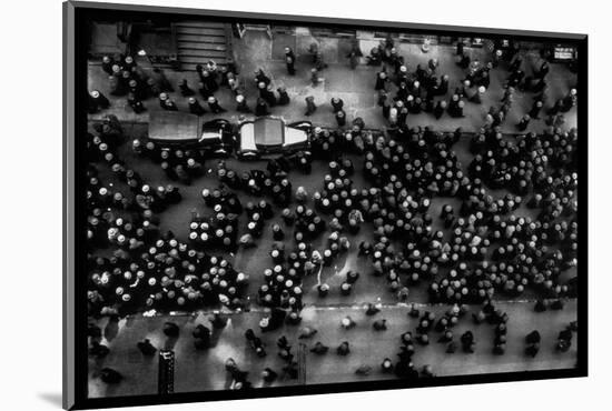Overhead View of Men Relaxing on 36th Street, Between Eighth and Ninth Aves.-Margaret Bourke-White-Mounted Photographic Print