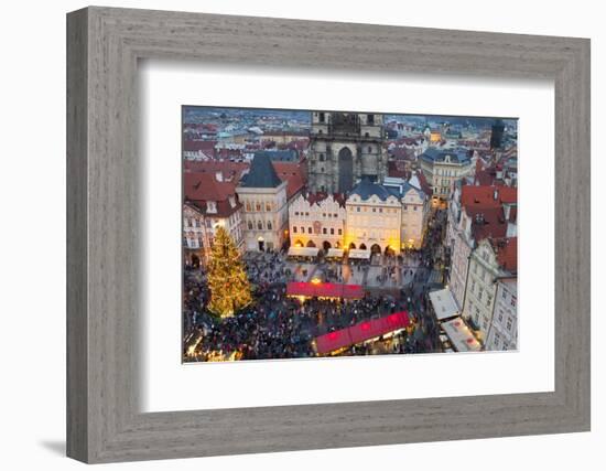 Overview of the Christmas Market and the Church of Our Lady of Tyn on the Old Town Square-Miles Ertman-Framed Photographic Print