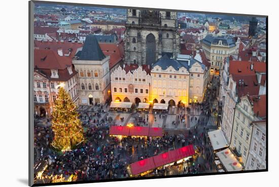 Overview of the Christmas Market and the Church of Our Lady of Tyn on the Old Town Square-Miles Ertman-Mounted Photographic Print