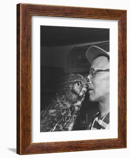 Owl Biting Man's Nose-Peter Stackpole-Framed Photographic Print