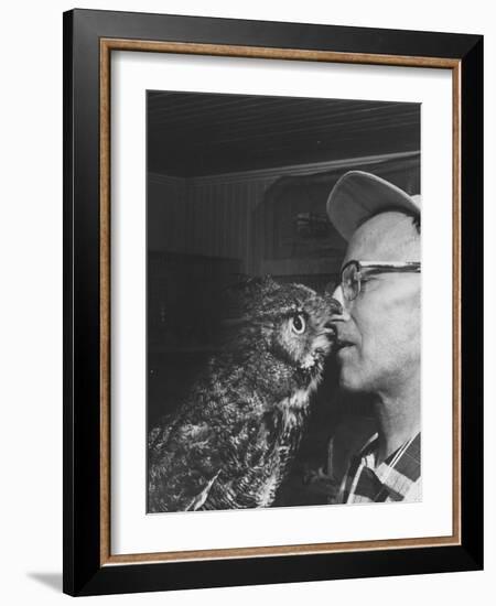 Owl Biting Man's Nose-Peter Stackpole-Framed Photographic Print