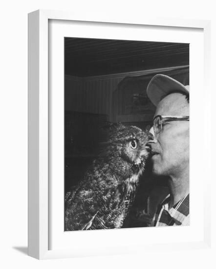 Owl Biting Man's Nose-Peter Stackpole-Framed Photographic Print