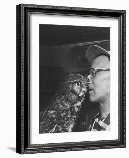 Owl Biting Man's Nose-Peter Stackpole-Framed Photographic Print