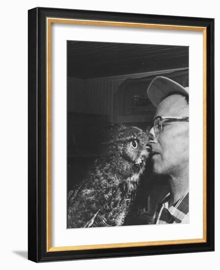 Owl Biting Man's Nose-Peter Stackpole-Framed Photographic Print