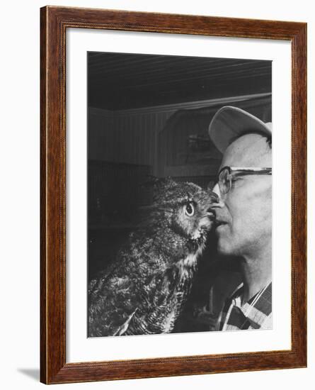 Owl Biting Man's Nose-Peter Stackpole-Framed Photographic Print