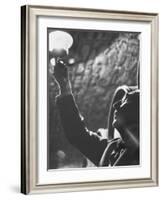 Owner of Vineyard Henri de Villaine Inspecting Wine for Clarity and Hue-Carlo Bavagnoli-Framed Photographic Print