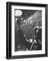 Owner of Vineyard Henri de Villaine Inspecting Wine for Clarity and Hue-Carlo Bavagnoli-Framed Photographic Print