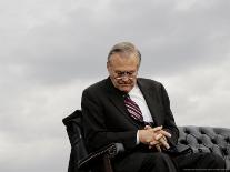 Outgoing Secretary of Defense Donald Rumsfeld Looks Down as He Sits on Stage-Pablo Martinez Monsivais-Photographic Print