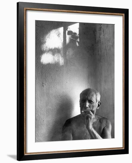 Pablo Picasso, Bare Chested and Smoking Cigarette-Gjon Mili-Framed Premium Photographic Print