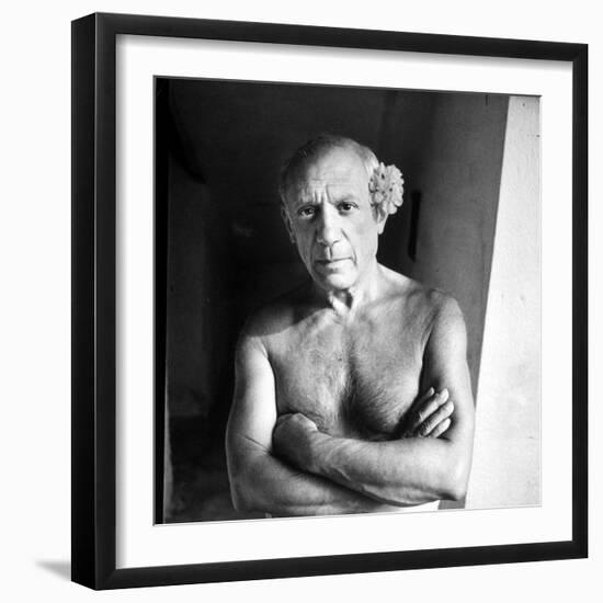 Pablo Picasso, Bare Chested and with Flower Tucked Behind Ear-Gjon Mili-Framed Premium Photographic Print