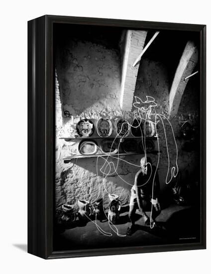 Pablo Picasso Drawing a Centaur in the Air with a Flashlight at Madoura Pottery-Gjon Mili-Framed Premier Image Canvas