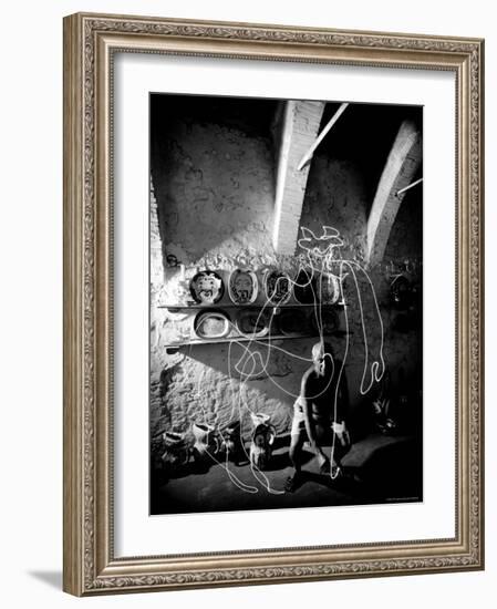 Pablo Picasso Drawing a Centaur in the Air with a Flashlight at Madoura Pottery-Gjon Mili-Framed Premium Photographic Print