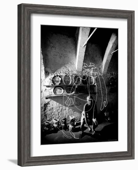 Pablo Picasso Drawing a Centaur in the Air with a Flashlight at Madoura Pottery-Gjon Mili-Framed Premium Photographic Print
