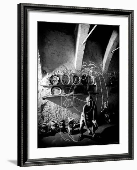 Pablo Picasso Drawing a Centaur in the Air with a Flashlight at Madoura Pottery-Gjon Mili-Framed Premium Photographic Print